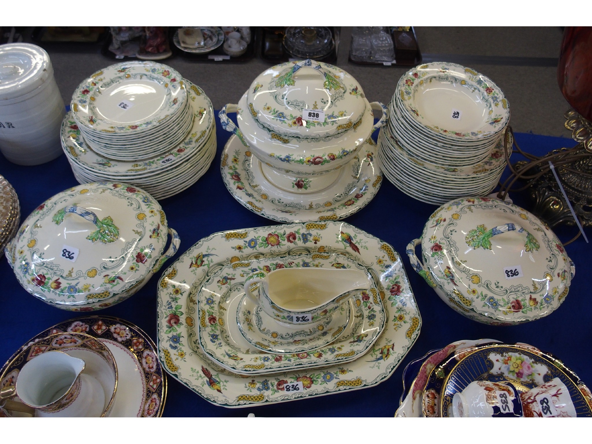 Appraisal: A Spode Royal Jasmine 'The Songster' pattern dinner service comprising