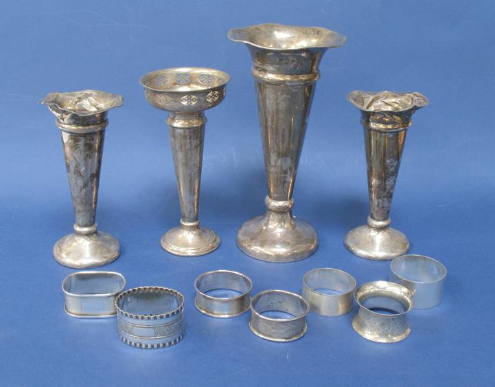 Appraisal: A SMALL COLLECTION OF SILVER comprising four various trumpet vases