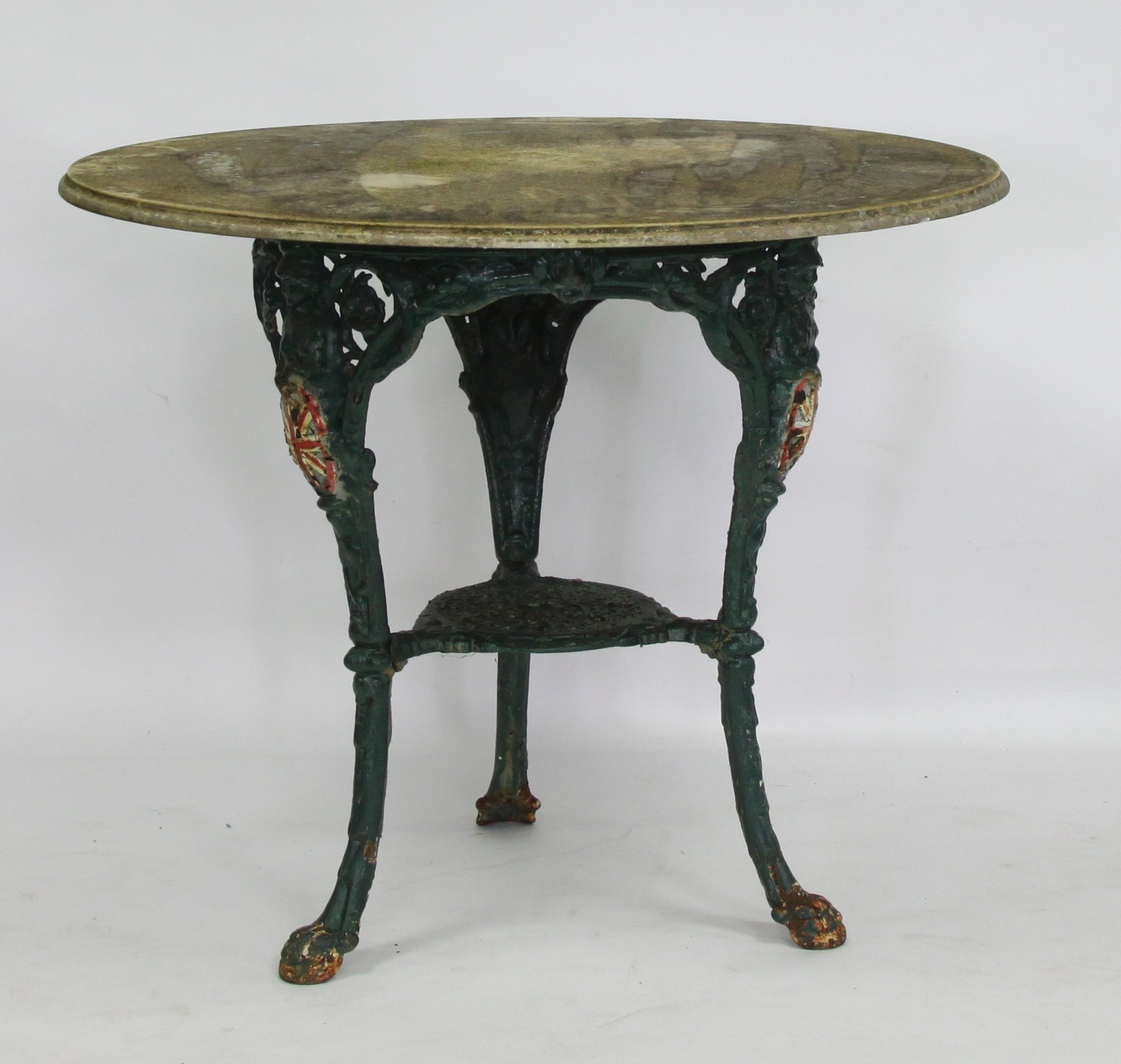 Appraisal: A marble top pub table with cast iron base