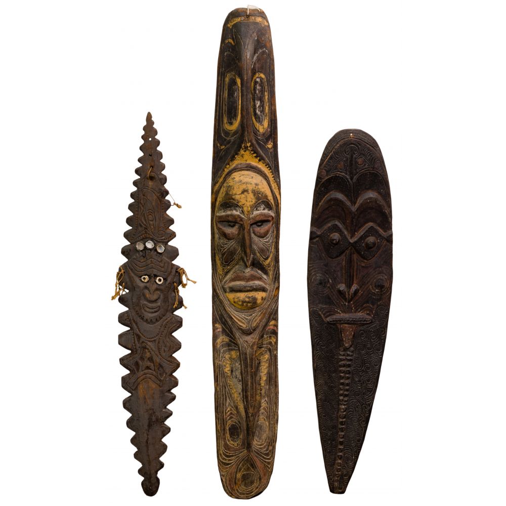 Appraisal: NEW GUINEA CARVED WOOD WALL MASKS ancestor boards having pigments