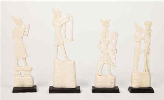 Appraisal: A Collection of Four Egyptian Carved Ivory Figures each depicted