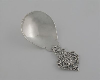 Appraisal: A late Victorian spoon with an openwork handle and a