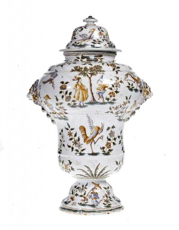 Appraisal: A CONTINENTAL FAIENCE VASE AND COVER of ogee form with