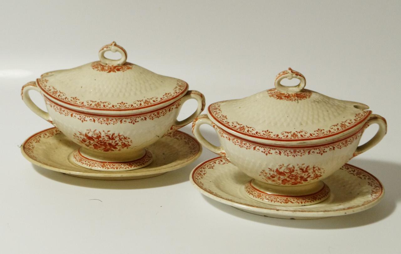 Appraisal: A pair of late thC Mintons Moustiers pattern sucriers each