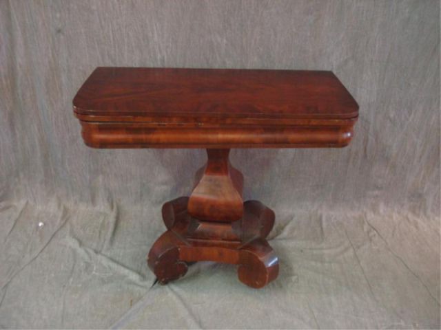 Appraisal: Empire flip-top game table with scroll feet Pedestal base From