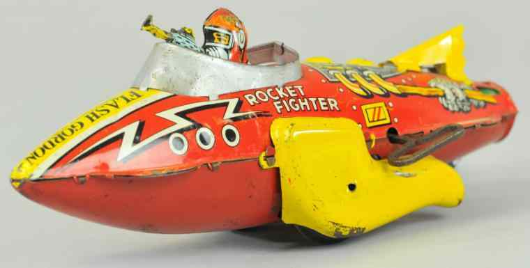 Appraisal: FLASH GORDON ROCKET FIGHTER Marx lithographed tin seated fight pilot