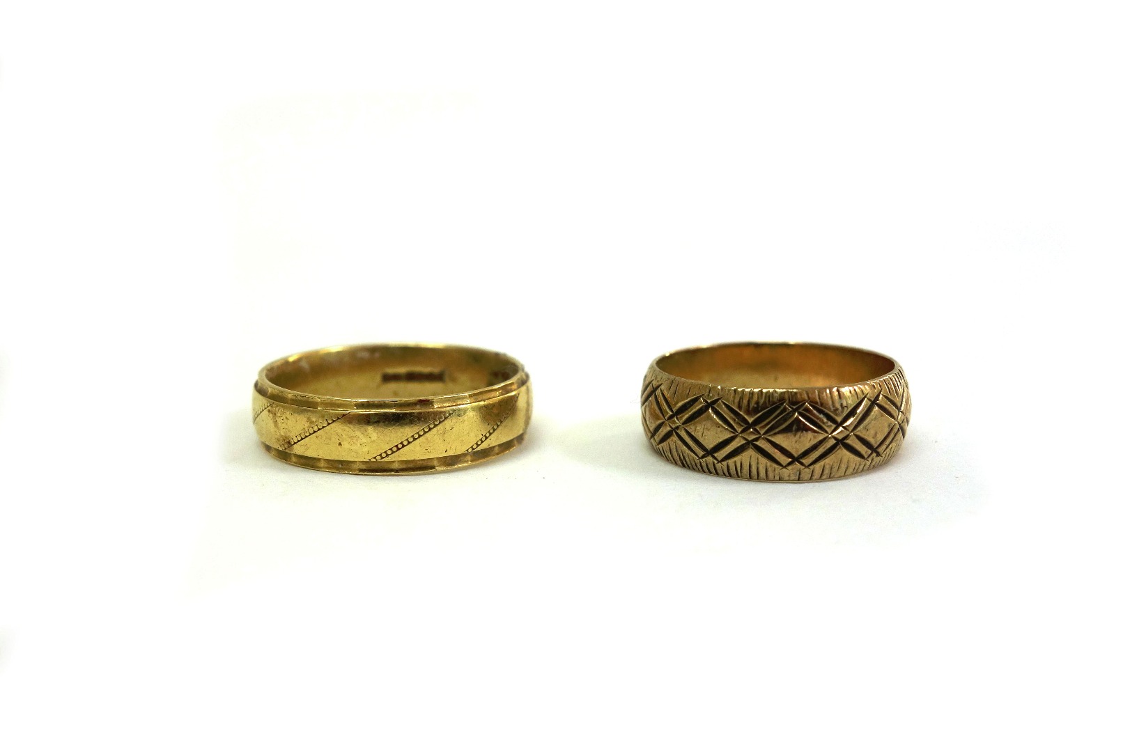 Appraisal: An ct yellow gold wedding band g and a ct