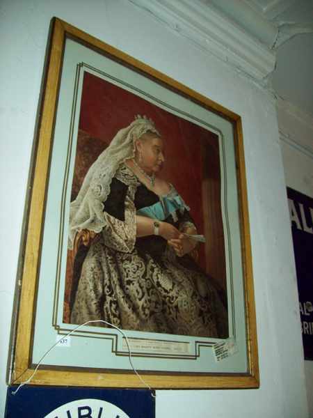 Appraisal: A GILT FRAMED COLOURED ENGRAVING OF QUEEN VICTORIA