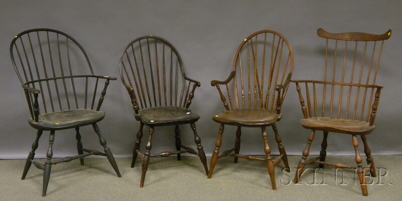 Appraisal: Four Windsor Armchairs a fan-back armchair a continuous armchair a