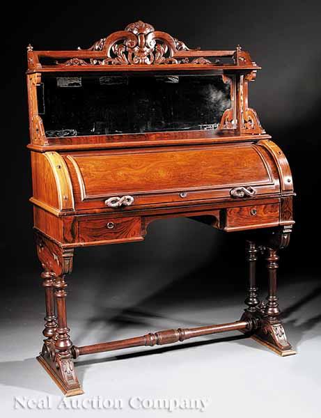 Appraisal: An American Renaissance Carved Rosewood Cylinder Desk late th c