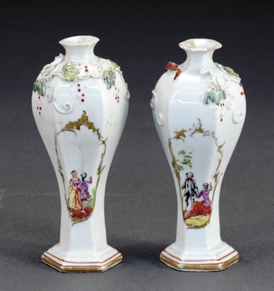 Appraisal: Pair Continental porcelain diminutive vases th century paneled baluster-form body