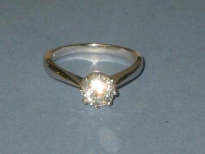 Appraisal: A SOLITAIRE DIAMOND RING the old brilliant cut stone approximately