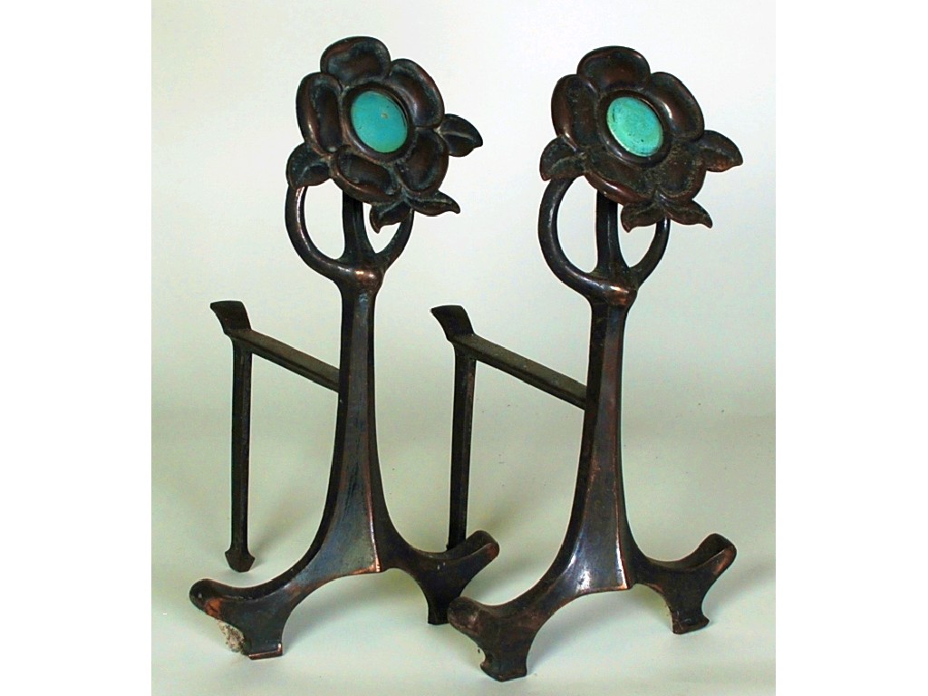 Appraisal: PAIR OF ART NOUVEAU GILT METAL CHENETS the flower pattern