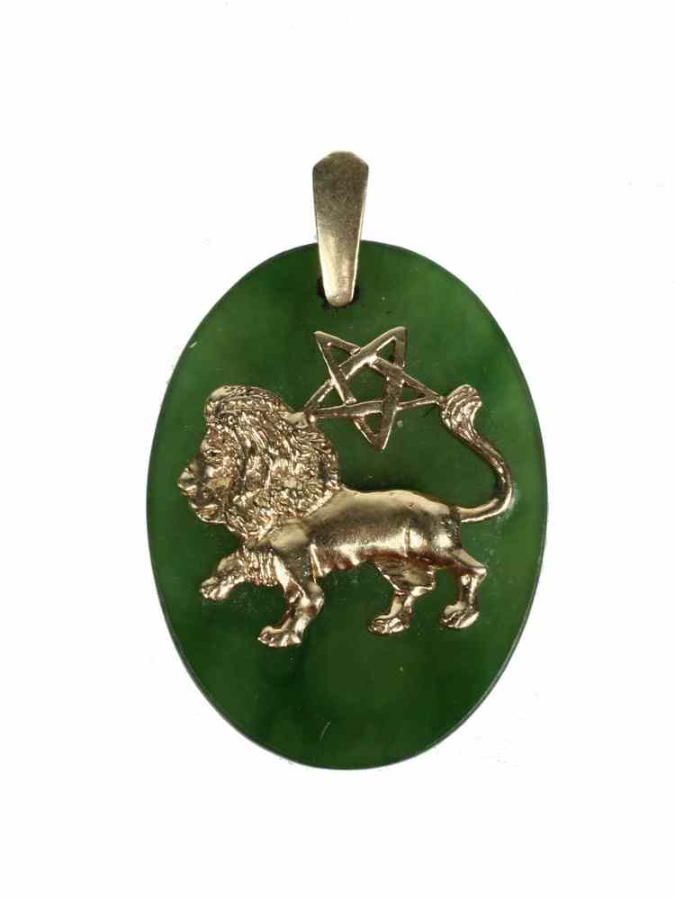 Appraisal: PENDANT - Oval jadeite mounted with K gold lion and