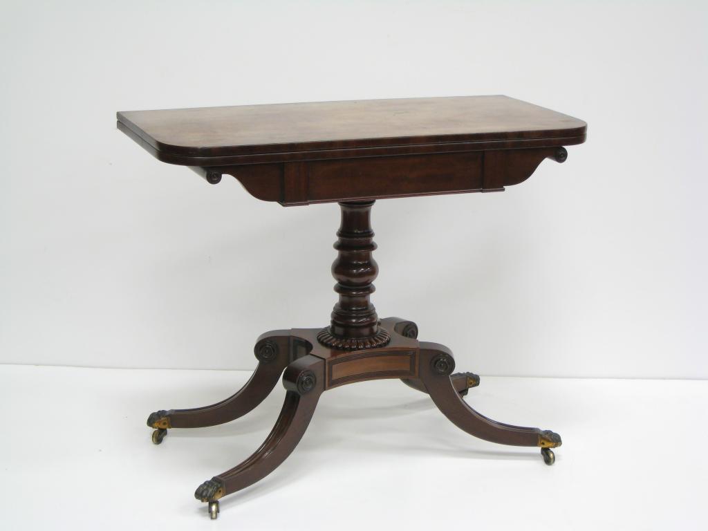 Appraisal: A Regency mahogany Tea Table with D shape fold-over top