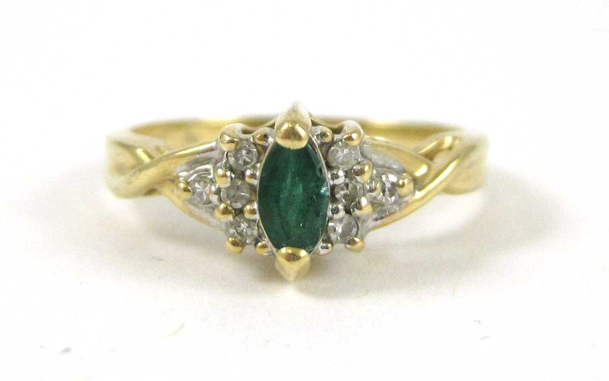 Appraisal: EMERALD DIAMOND AND FOURTEEN KARAT GOLD RING with four round