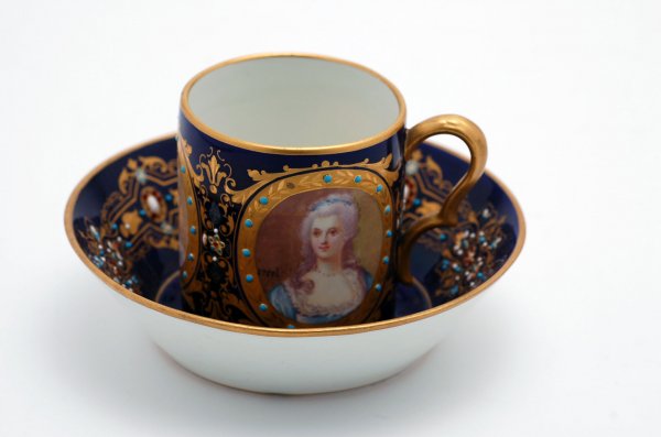 Appraisal: th century Severs portrait cup and saucer with raised red