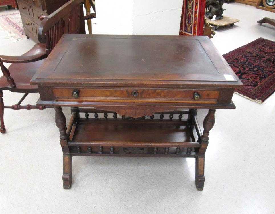 Appraisal: A VICTORIAN WALNUT WRITING TABLE American c the rectangular top