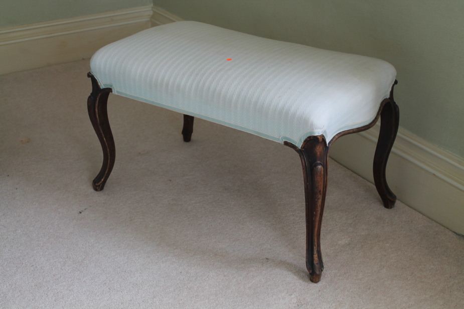 Appraisal: A Victorian walnut serpentine stool with cabriole legs cm x