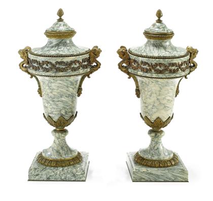 Appraisal: Pair of Louis XVI style gilt metal mounted marble urns