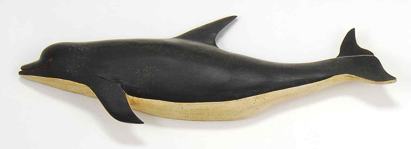 Appraisal: CLARK VOORHEES CARVED WHITE-SIDED DOLPHIN SILHOUETTEInitialed CV'' and stamped signature