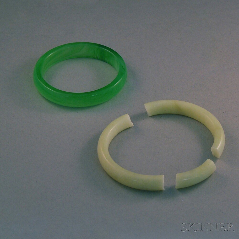 Appraisal: Two Bangles China one green glass one white stone white