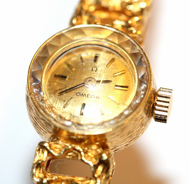 Appraisal: A LADIES CT GOLD OMEGA WRIST WATCH with gilt dial