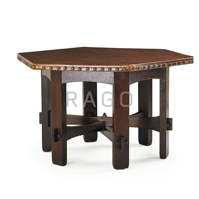 Appraisal: GUSTAV STICKLEY Library table with hexagonal top and stacked stretchers