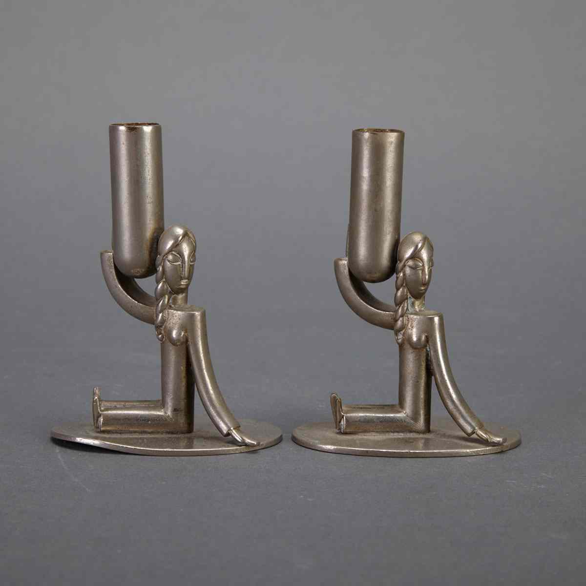 Appraisal: Pair Hagenauer Nickel Plated Bronze Figural Candlesticks c each impressed