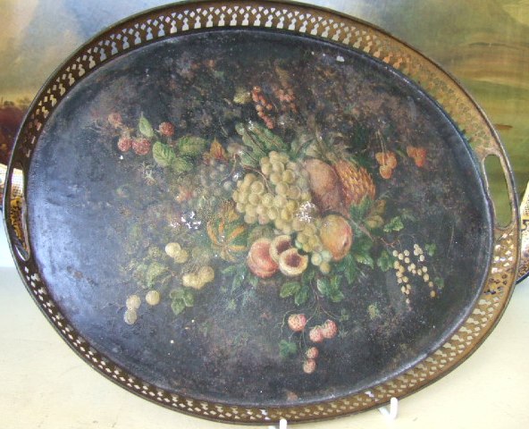 Appraisal: A tole-ware two handled tray th century of oval form