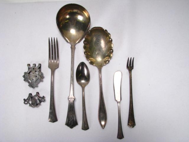 Appraisal: Assortment of stainless and silver plate utensils including International knives