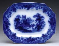 Appraisal: FLOW BLUE PLATTER IN THE GOTHIC PATTERN Bottom marked J