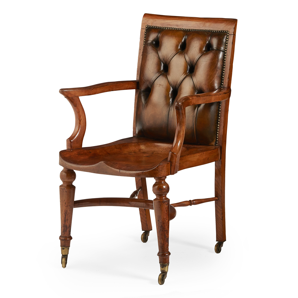 Appraisal: GEORGE IV ELM AND LEATHER UPHOLSTERED DESK CHAIR CIRCA the