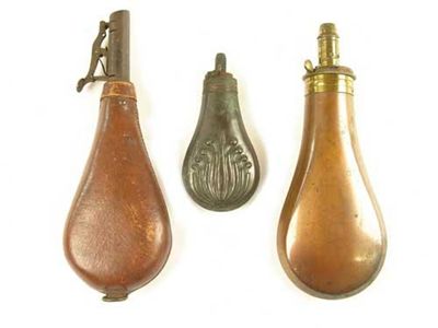 Appraisal: A th century copper powder flask with brass 'Sykes Patent'