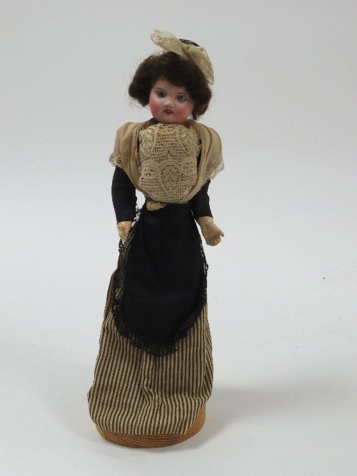 Appraisal: A French bisque head doll the head impressed SFB Paris