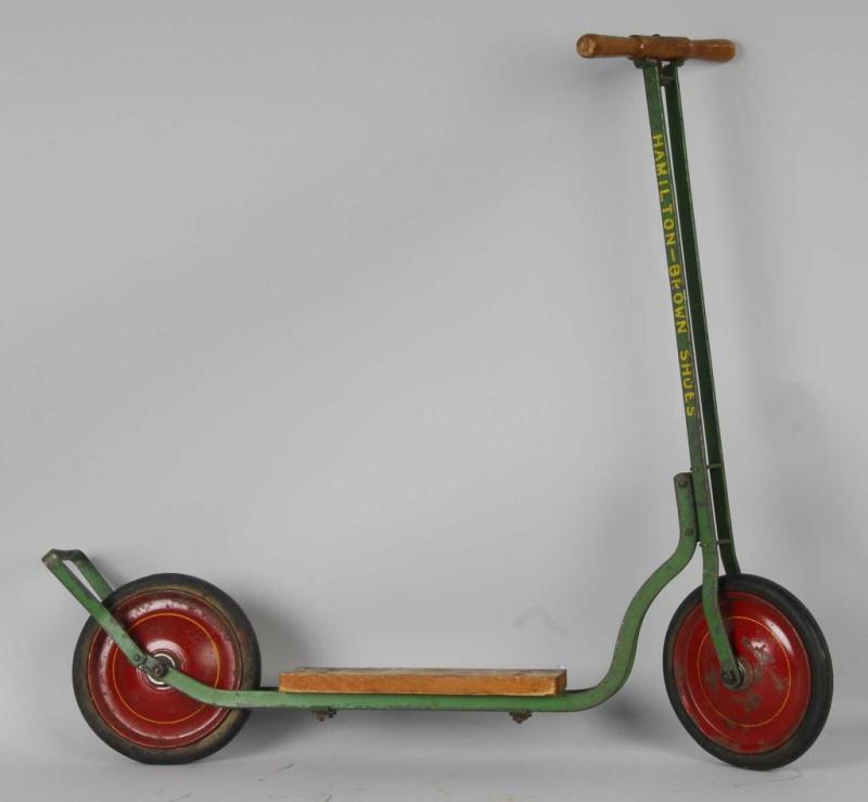 Appraisal: Pressed Steel Wooden Metalcraft Scooter Toy Description American Steel wheels