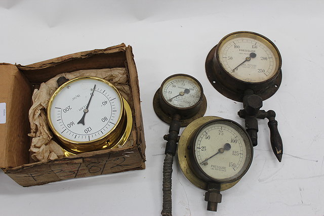 Appraisal: A BRASS STEAM GAUGE the white painted dial with numerals