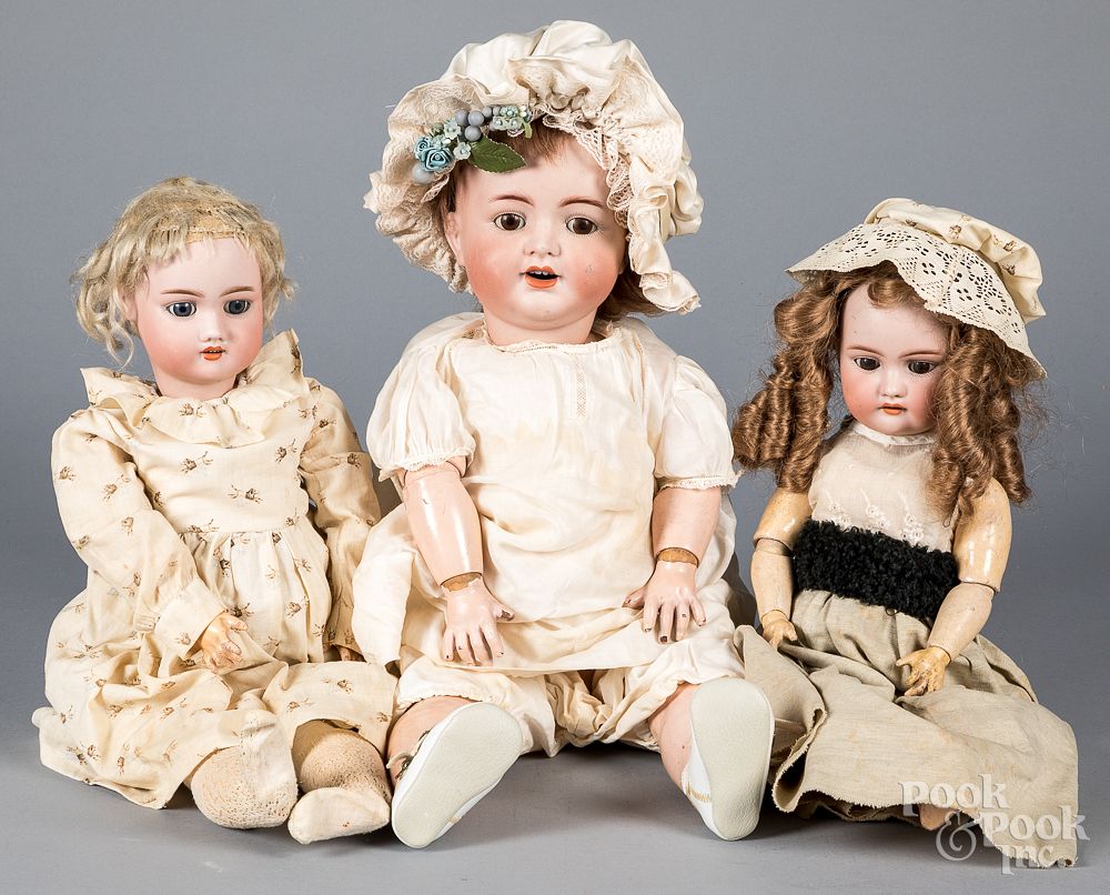 Appraisal: Three bisque head dolls Three bisque head dolls to include