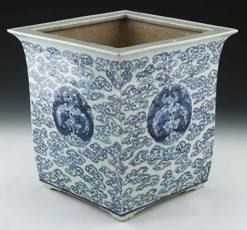 Appraisal: Chinese Qing blue and white porcelain planter depicting dragons in