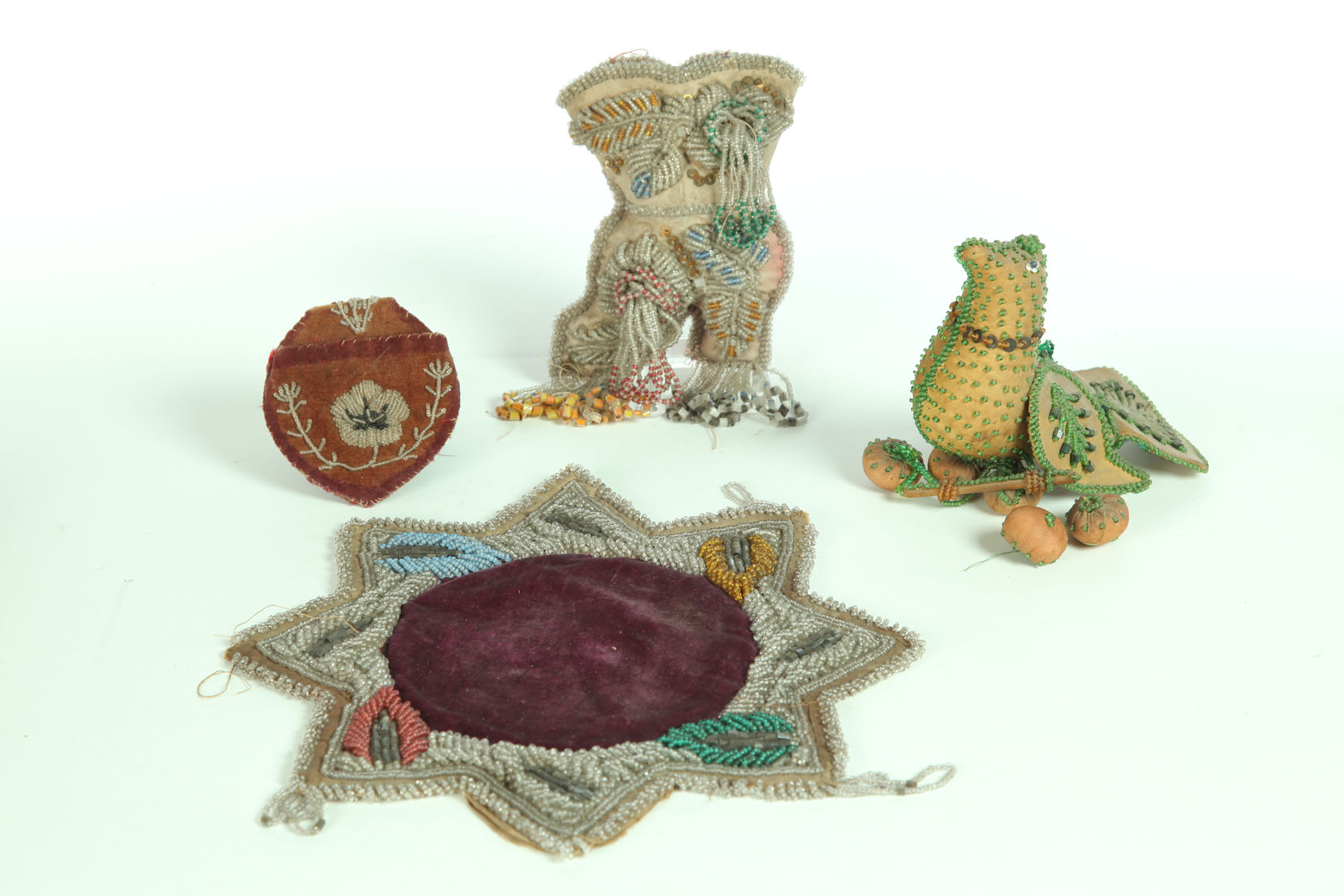 Appraisal: FOUR PIECES OF INDIAN BEADWORK Iroquois th century Beadwork on