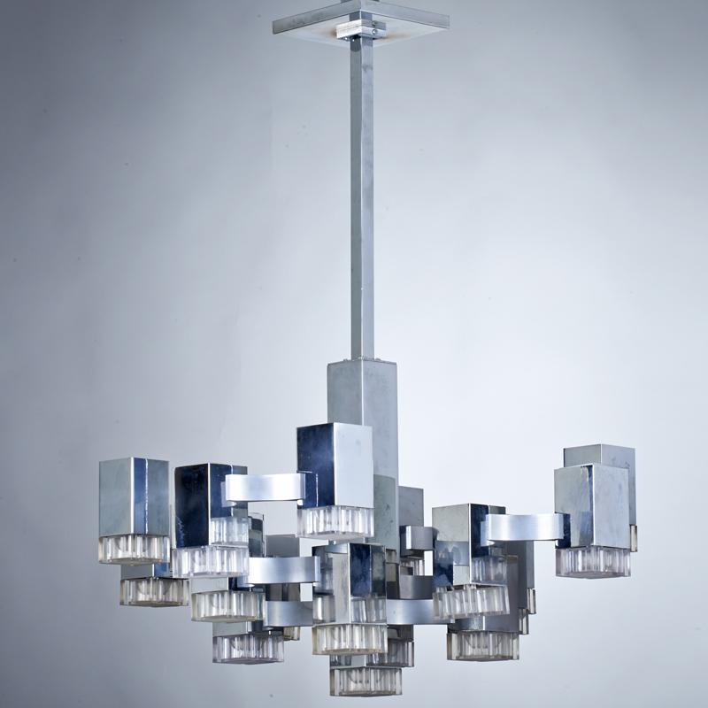 Appraisal: GAETANO SCIOLARI LIGHTOLIER Cubic seventeen-light chandelier Italy s Chromed steel