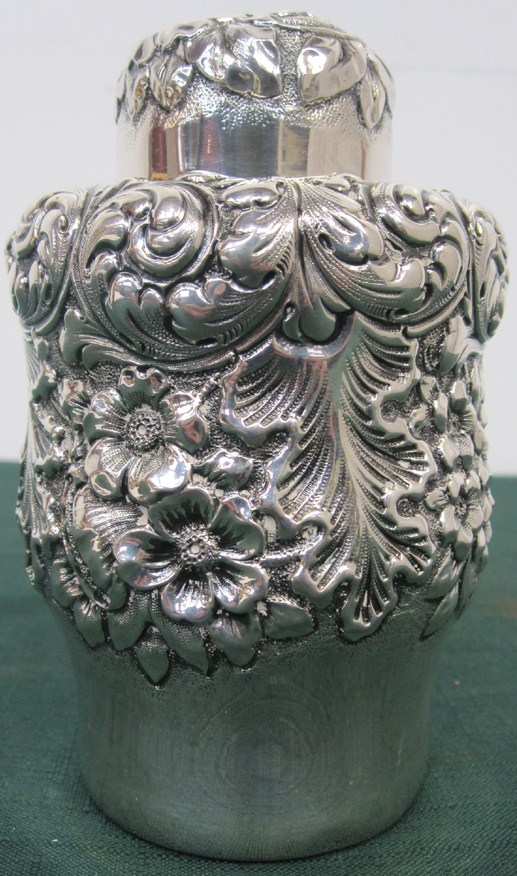 Appraisal: STERLING SILVER JAR With repousse foliate scroll and floral decoration