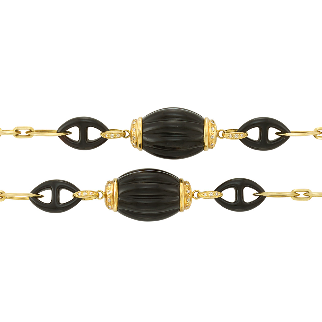 Appraisal: Long Gold Fluted Black Agate Black Agate Nautical Link and