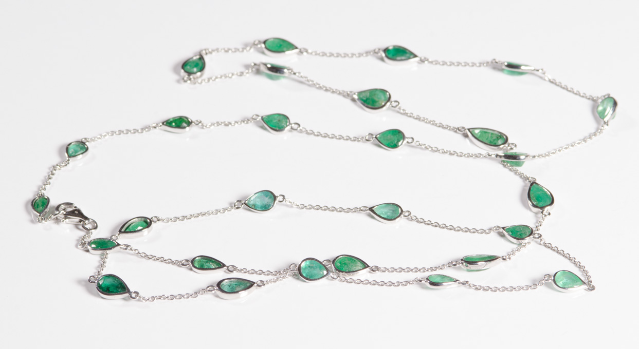 Appraisal: EMERALD AND FOURTEEN KARAT WHITE GOLD RIVIERE NECKLACE measuring inches