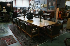 Appraisal: A huon pine boardroom table together with a set of