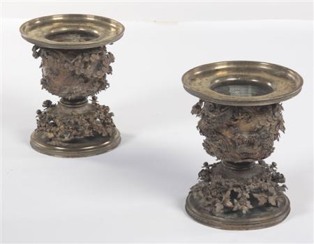 Appraisal: A pair of th century Japanese cast bronze usubata urns