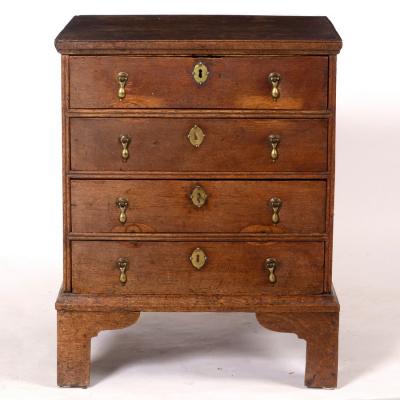 Appraisal: A late th Century style oak chest fitted four drawers