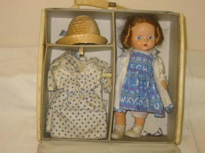 Appraisal: A Pedigree plastic girl doll with sleeping eyes and light