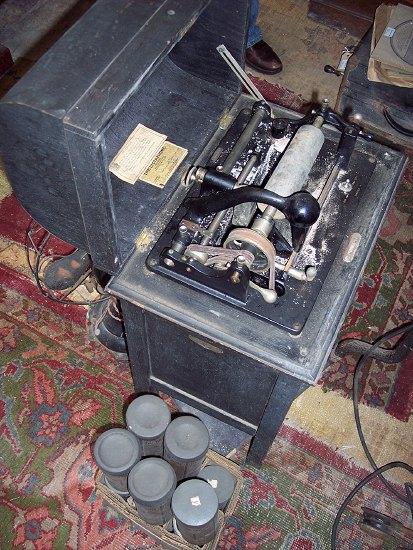 Appraisal: A Dictaphone shaving machine in wooden case with stand together