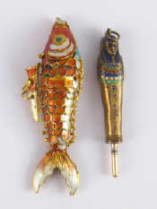 Appraisal: A propelling pencil in the form of an enamelled Egyptian